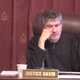 Indiana Supreme Court Justice Steven David weighing whether removing an unlabeled GPS tracker from one’s car is really theft or just a good idea.